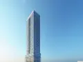Nowoczesny wieżowiec z przeszkloną fasadą na tle błękitnego nieba. Trudno jednoznacznie określić, ile pięter ma ten skytower, ale z pewnością jest ich wiele.