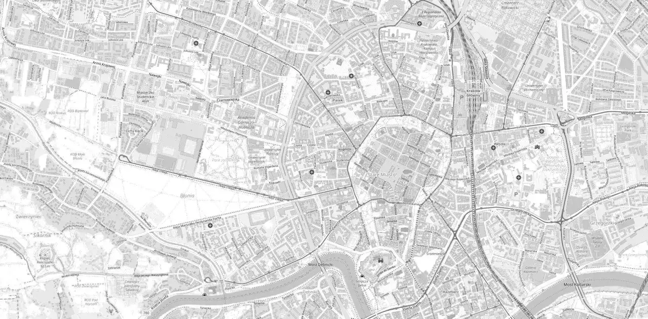 Mapa Krakowa z zaznaczonymi ulicami, budynkami i terenami zielonymi. Idealna, by sprawdzić położenie działki i zaplanować trasę.